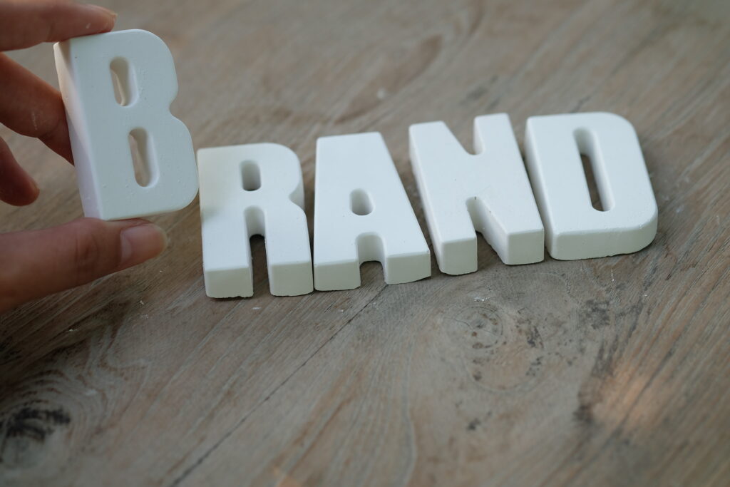 hand-arrange-white-letters-brand-1024x683 How to Build a Personal Brand That Sells for You